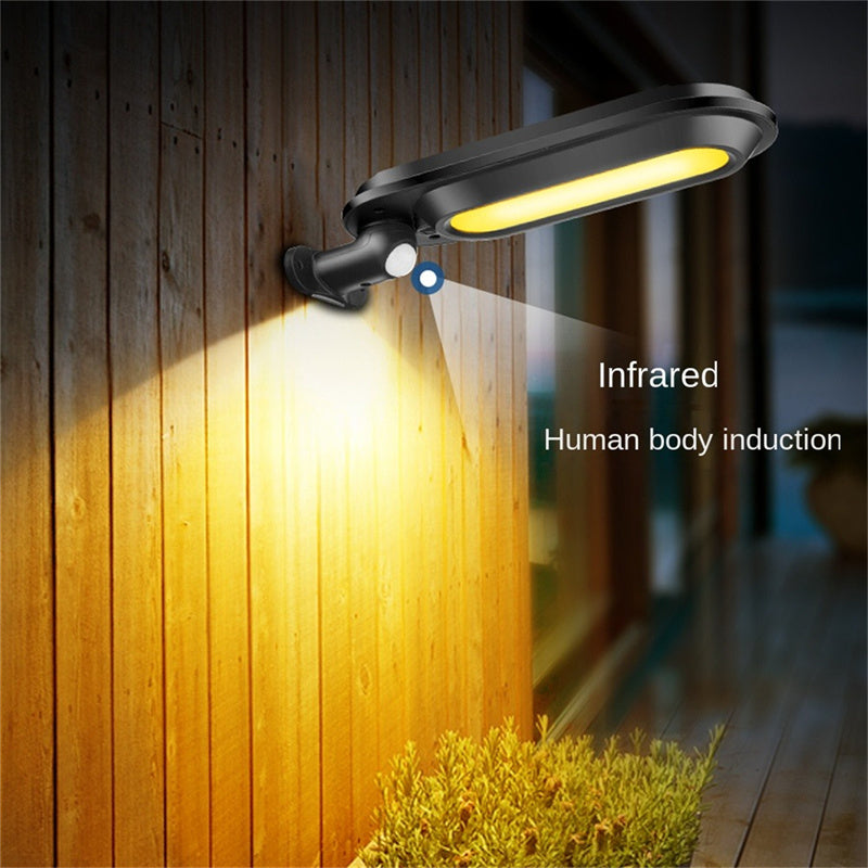 Solar wall light with adjustable motion sensor