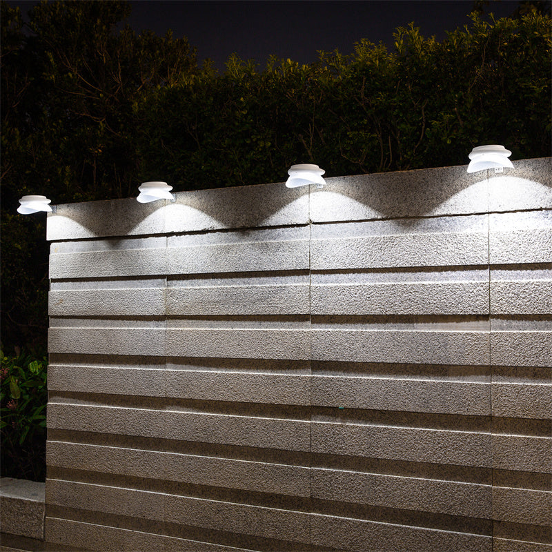 Solar fence light decorative pattern on garden wall